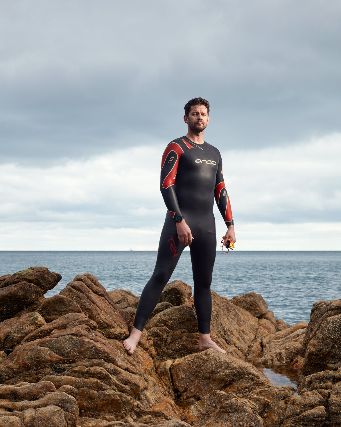 sports photography of a triathlete driven to succeed