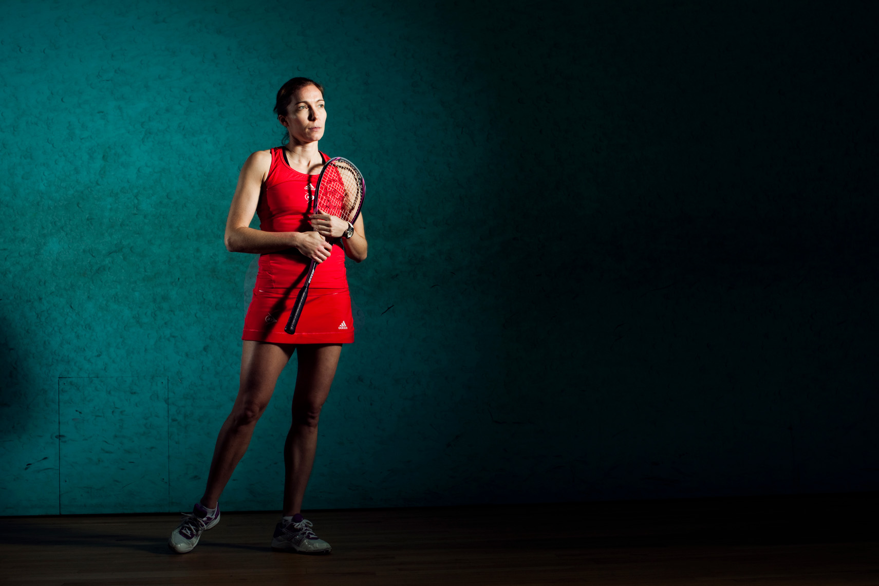 sports action photography: madeline perry squash player