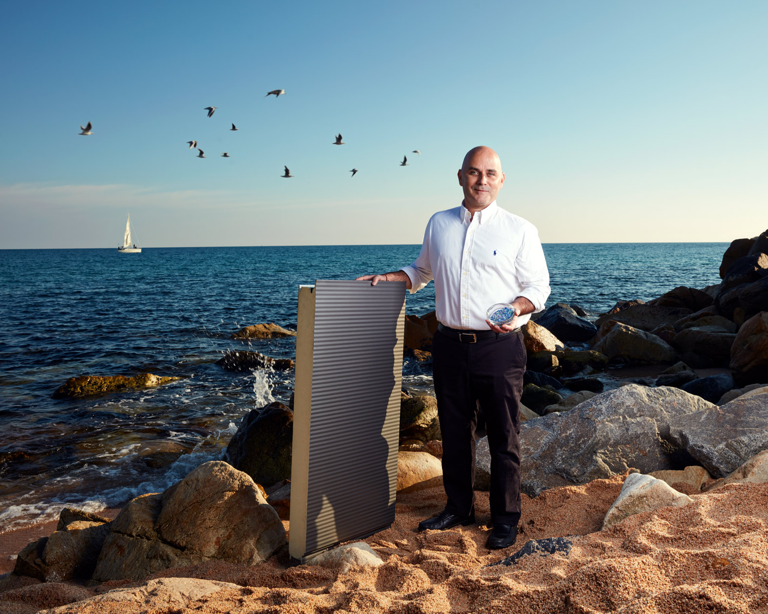 business photography: executive standing on beach