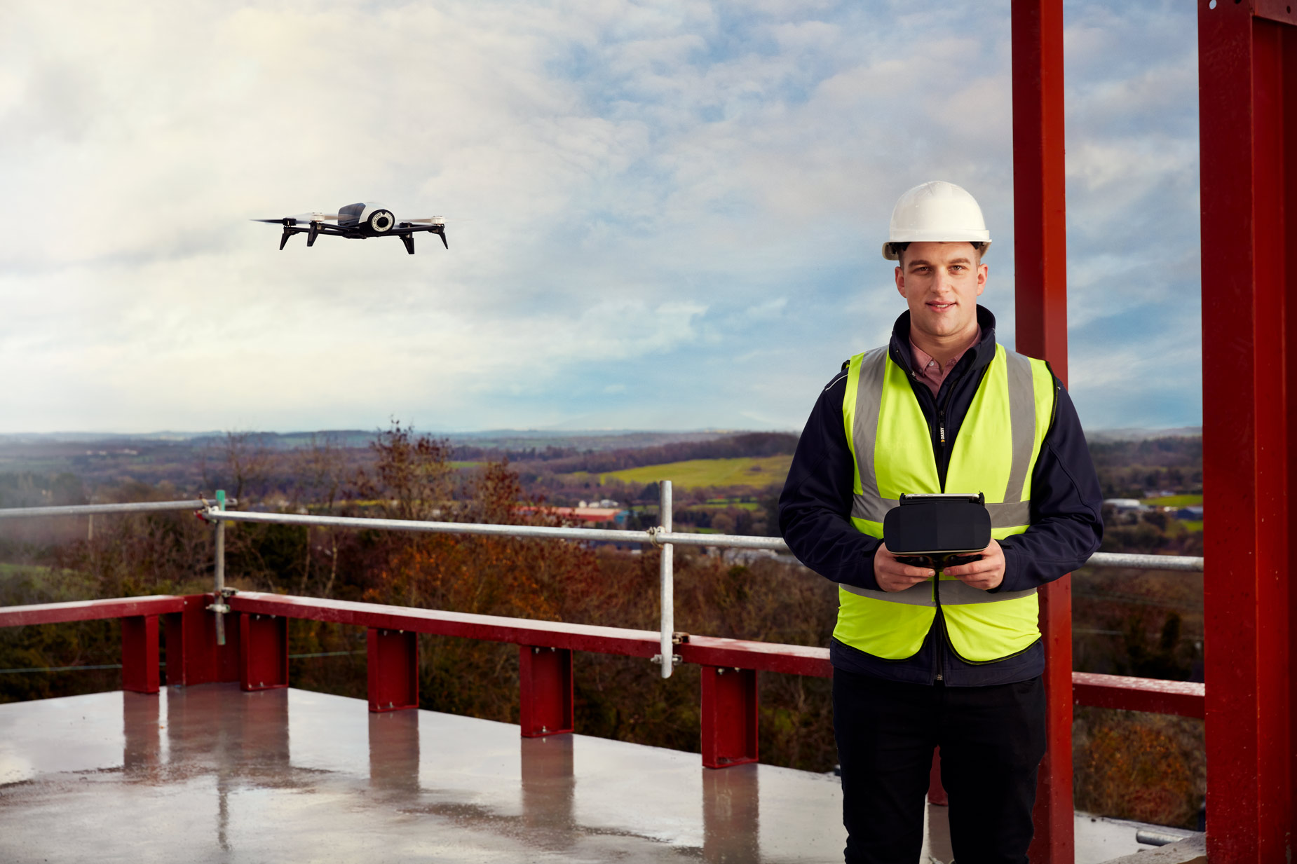 environmental photography: engineer with drone at kingspan new build