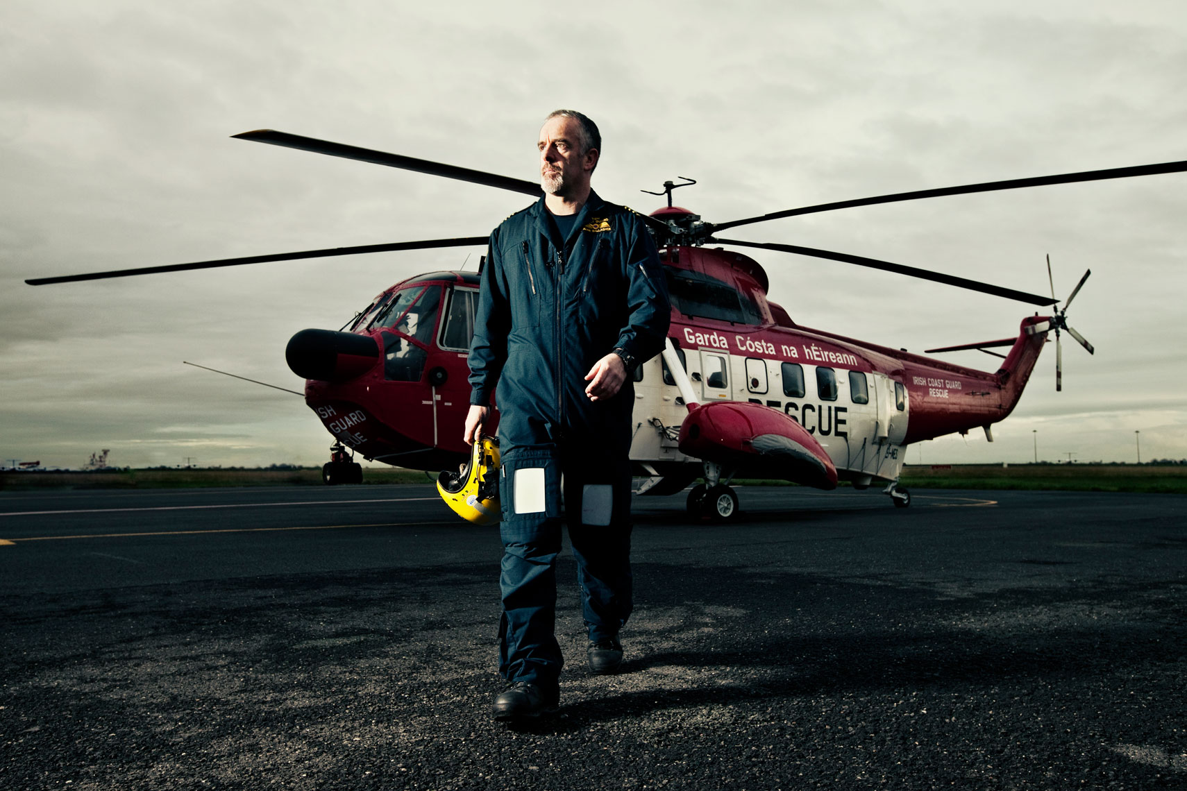 portrait photography: coast guard winchman with helicopter