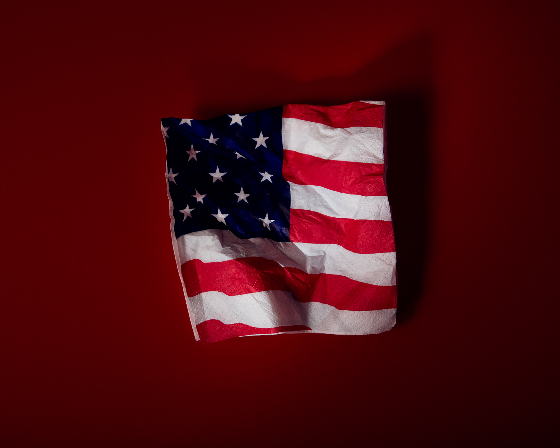 still life photographer: us flag crumpled napkin