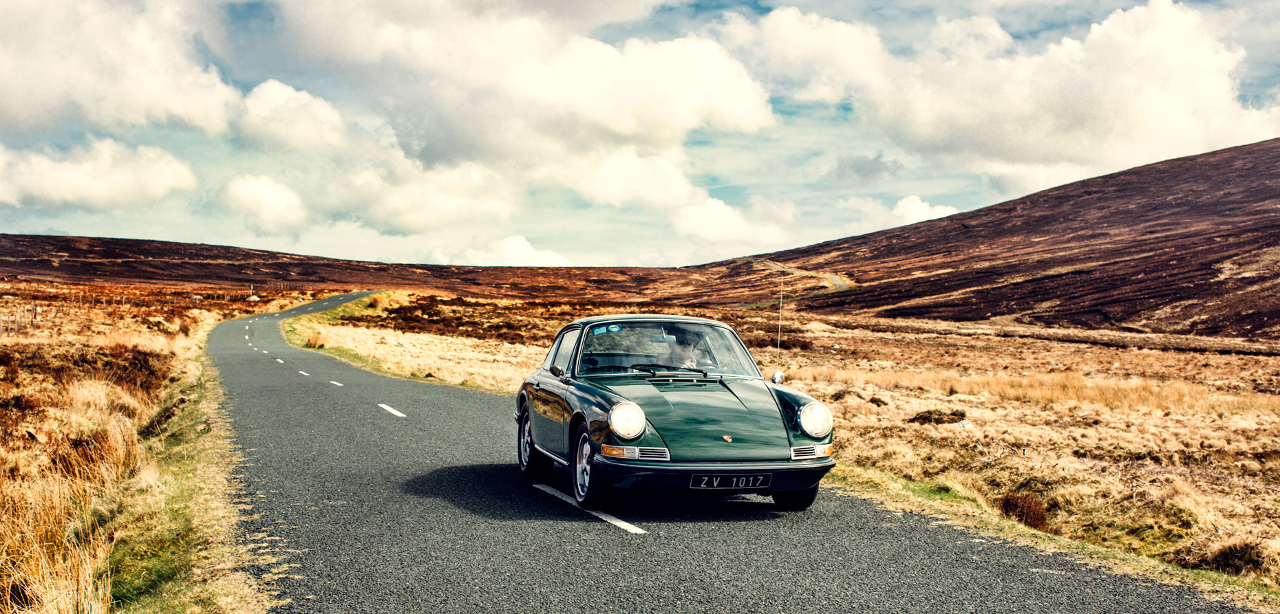 portrait photography: a vintage porsche on the open road